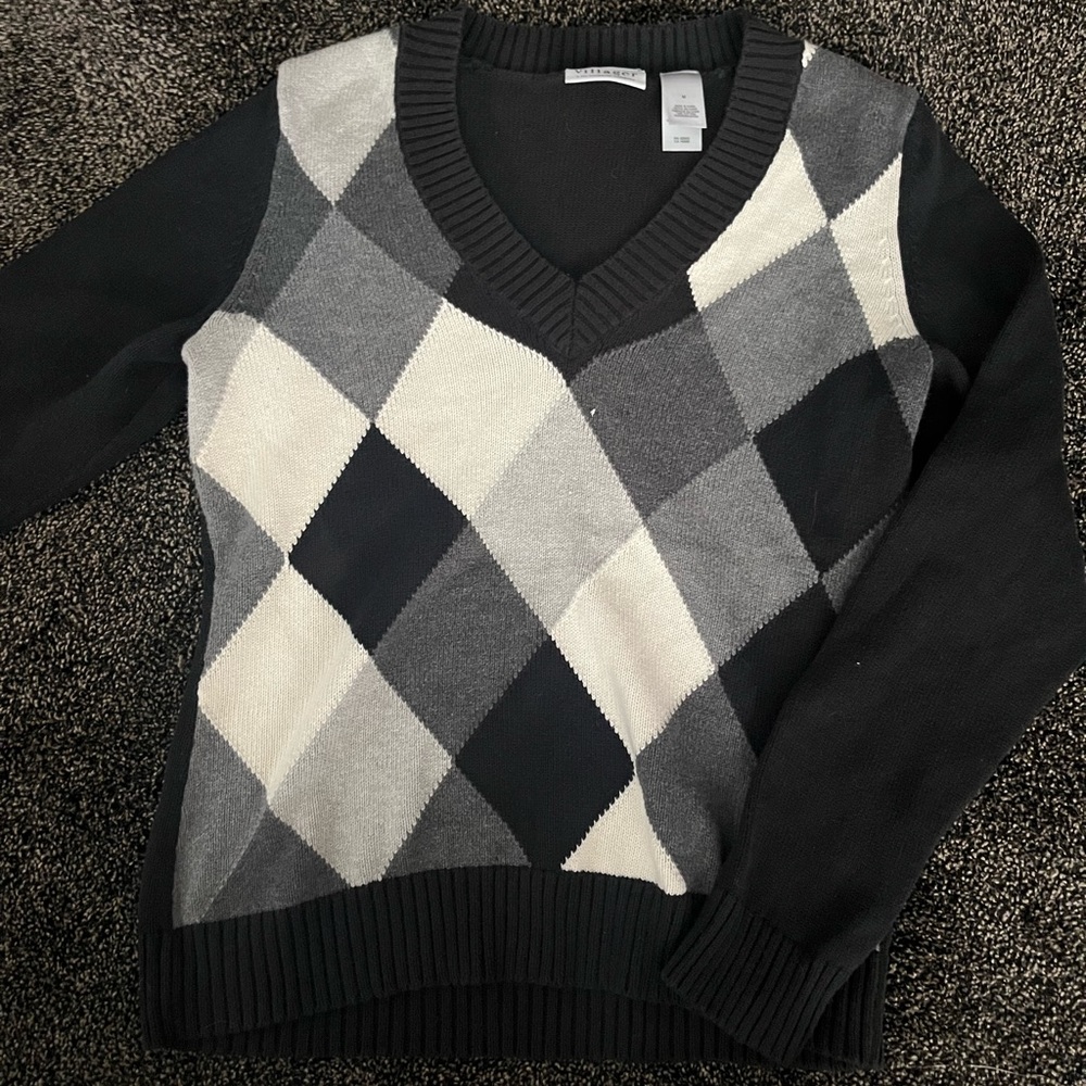 size medium black, gray, and white checkered sweater
